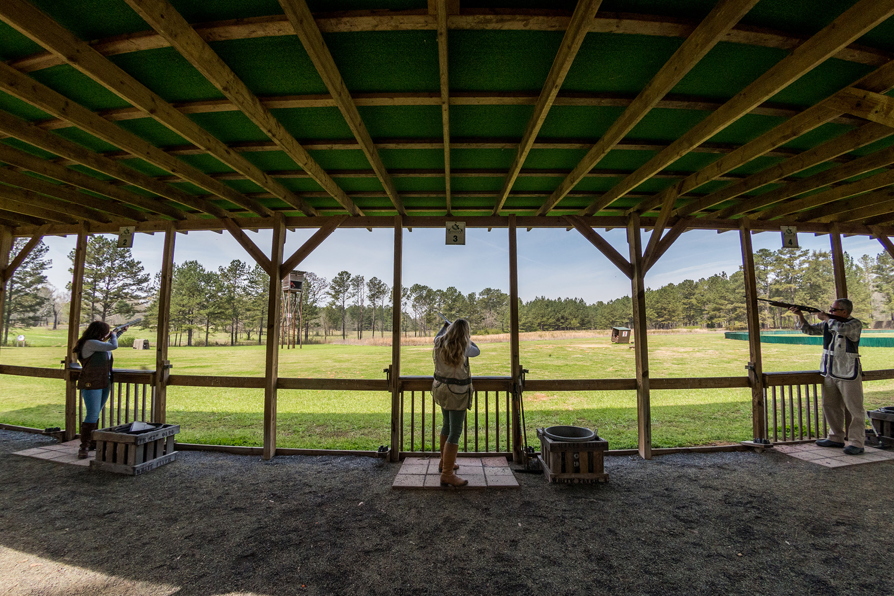 five stand selwood farms behind guests on shooting range